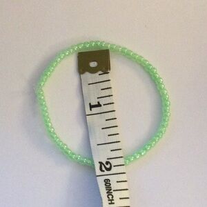 Green pearl seed bead5/10